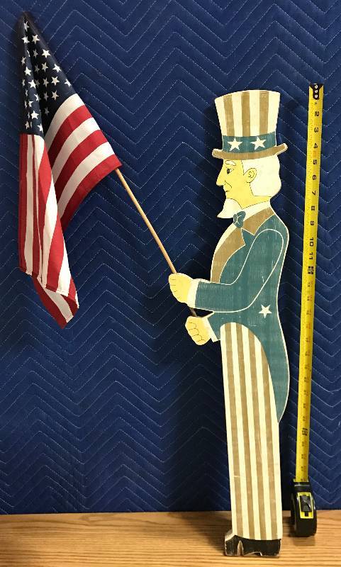 lot 3424 image: Wooden Uncle Sam hold the U.S. Flag