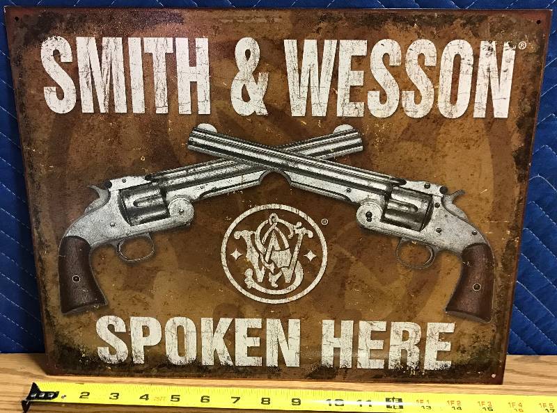 lot 3425 image: Nostalgic Metal Smith & Wesson Revolver Sign Spoken Here