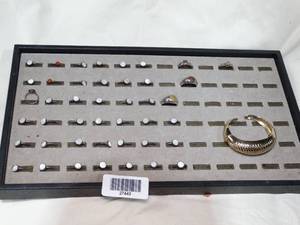 lot 27443 image: Ring Display w sterling Rings and a Bracelet