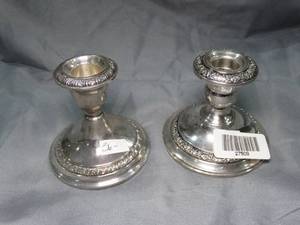 lot 27509 image: Concrete Filled Sterling Candle Holders