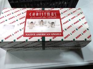 lot 27537 image: 3 small native American Christmas angles