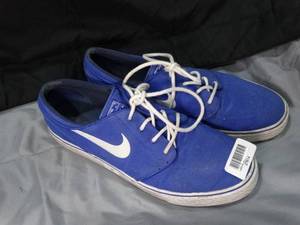 lot 27614 image: Blue and White 12 Nike Shoes