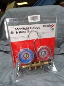lot 27674 image: Manifold Gauge and Hose Set