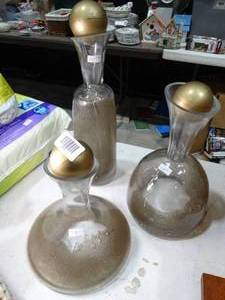 lot 27711 image: 3 Different Tall Unique Glass Vessels