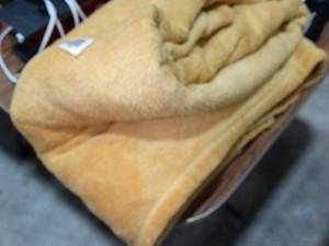 lot 27740 image: Gold Toned Warm Throw