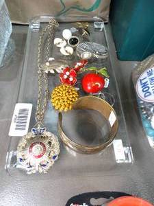 lot 27800 image: Glass Platter with Variety of Jewelry