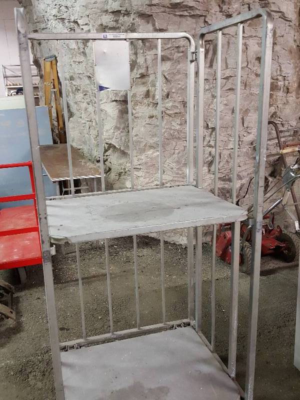 lot 7659 image: Heavy duty work rack with big 6 OD casters.  68 tall, 30 wide and 34 deep.