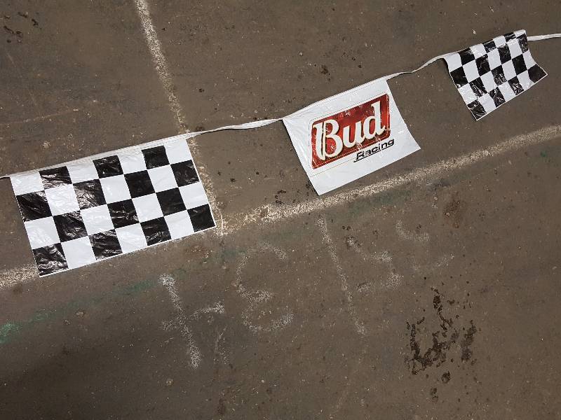 lot 7602 image: 50 feet long vinyl race shop, man cave or decoration Budweiser and checkered flags with a bunch of 14 individual flags on the run.