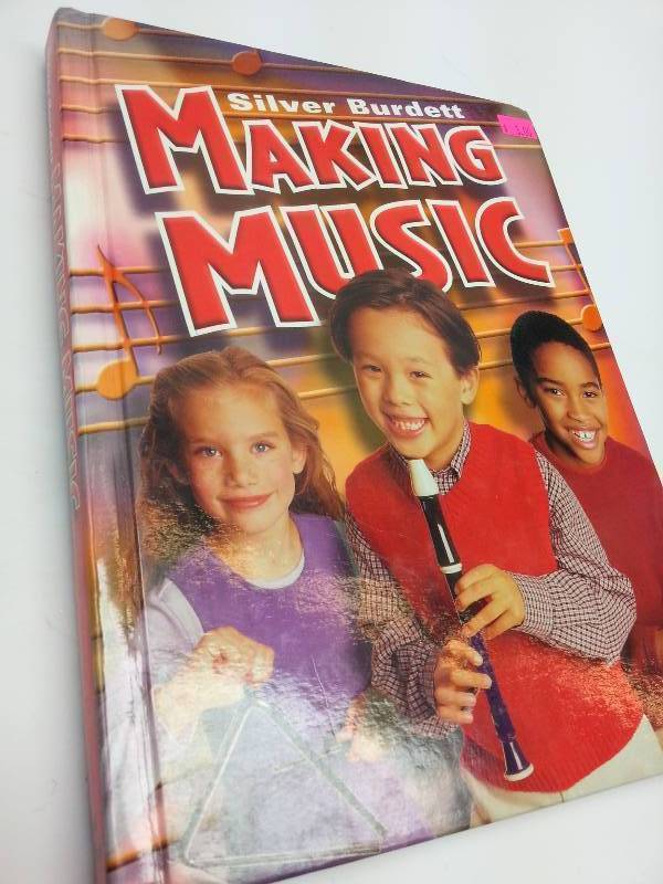 lot 9043 image: Over 400 pages of Making Music information and fun things to do and sing in this Red Cover book.