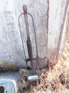 lot 6909 image: Antique Mole Trap & Raccoon Trap