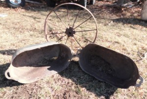 lot 6907 image: Antique Wagon Wheel with Vintage Iron Planters