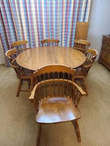 lot 1001 image: Dining table 29 x 48, 6 chairs and two 10 leaves solid hard rock maple from Tell City Chair Co. Comes with fitted plastic protector