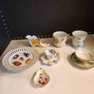 lot 1014 image: Tea cups & saucers, decorative shoe, cups and plate