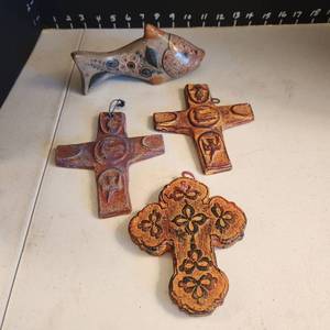 lot 1023 image: Crosses and clay fish signed