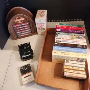 lot 1050 image: Comedy Superstars cassettes, Sony Walkman II and assorted cassettes