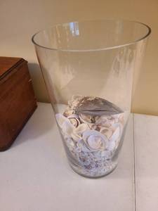 lot 1059 image: Glass vase 17 tall with sea shells, heavy