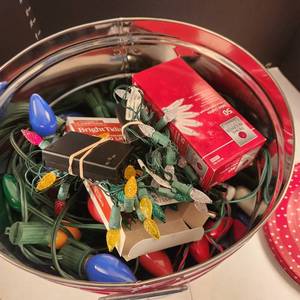 lot 1078 image: Christmas lights and tin