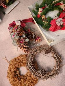 lot 1099 image: Hanging pinecone decor and 3 wreaths