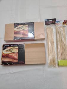 lot 1130 image: Six cedar grilling planks and bamboo skewers