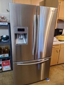 lot 1138 image: Samsung refrigerator 70 x 36 x 32 works good