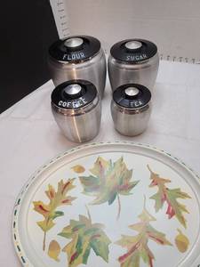 lot 1139 image: Vintage metal canisters and a tray