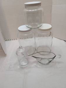 lot 1173 image: Clear glass jars, tallest is 10 and a gravy boat