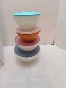 lot 1190 image: Four Tupperware bowls and lids