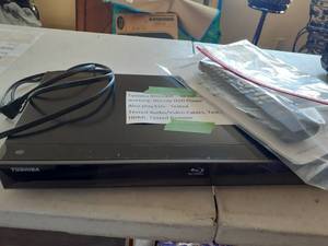 lot 3085 image: Toshiba Blu-ray and DVD player with remote