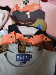 lot 3207 image: Ladies shirts. Size small and medium. See pictures for brands.