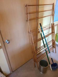lot 3300 image: Wooden clothes drying rack 60 tall folded, metal waste basket, dusting wand