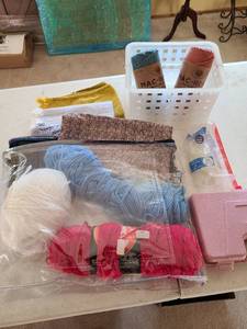 lot 3305 image: Glue gun in case, glue sticks, yarn, two unused 77 yd. rolls mac-re-me
