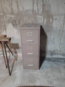 lot 3502 image: 3 drawer filing cabinet. 40 x 15.5 x 18. Located in basement