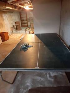 lot 3511 image: Ping pong table with net. 29 x 109 x 60. Located in basement