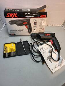 lot 4014 image: Skil electric drill and bits