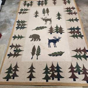 lot 4020 image: Indoor rug with tree, bear, moose pattern, 5 x 7