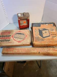 lot 4100 image: Coleman folding aluminum Hi-Stand, toastergriddlebroiler, camp oven, can of fuel half full