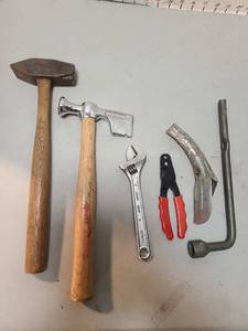 lot 4103 image: Vintage rock hammer, drywall hammer, tire wrench and other tools