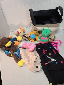 lot 4110 image: Small dog toy bag, toys, sweater, nail clippers