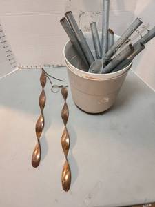 lot 4124 image: Bucket with windchimes and coppertone hanging swirlies