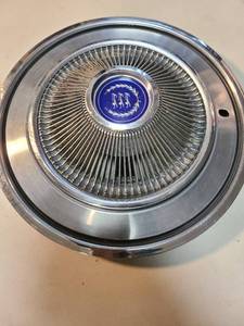 lot 4129 image: Mercury Cougar hub cap