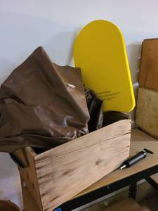 lot 4325 image: Yellow swim kickboard, 3 brown treegator water bags, hand pump, wooden box