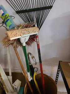 lot 4326 image: Leaf rake, mops, one new refill in pkg, gutter washer, sprinkler wand in cardboard barrel