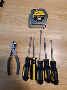 lot 4331 image: Stanley screwdrivers and measuring tape plus a pair of pliers
