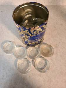 lot 4425 image: 18 Vintage glass chair and table leg coasters and a few rubber ones
