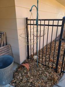 lot 5050 image: Shepherds hook, 2 metal hanging baskets, lantern decor