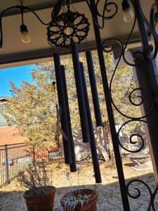 lot 5052 image: Black metal wind chimes