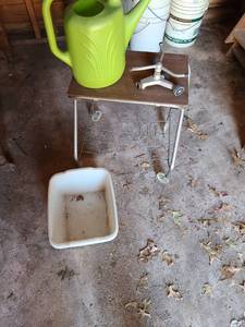 lot 5111 image: Vintage record player table on wheels (repair needed), sprinkler, watering can, plastic tub