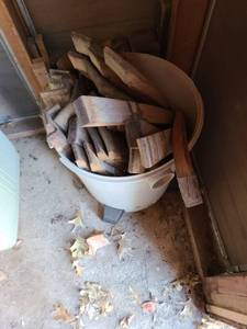 lot 5123 image: Empty shop vac bucket on rollers with wood barrel pieces