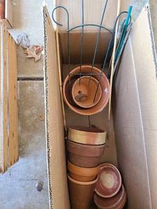 lot 5210 image: Clay flower pots, saucers, small wire trellis