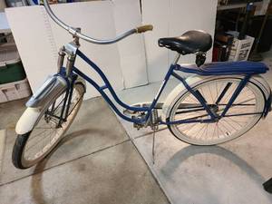 lot 6005 image: Vintage Rocket bicycle 28 by Monark Silver King, Inc. bluewhitered